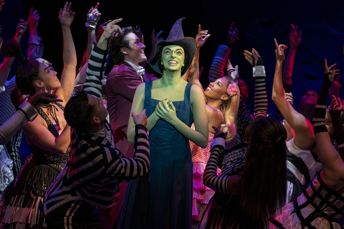 Talia Suskauer as Elphaba arrives at Shiz in Wicked