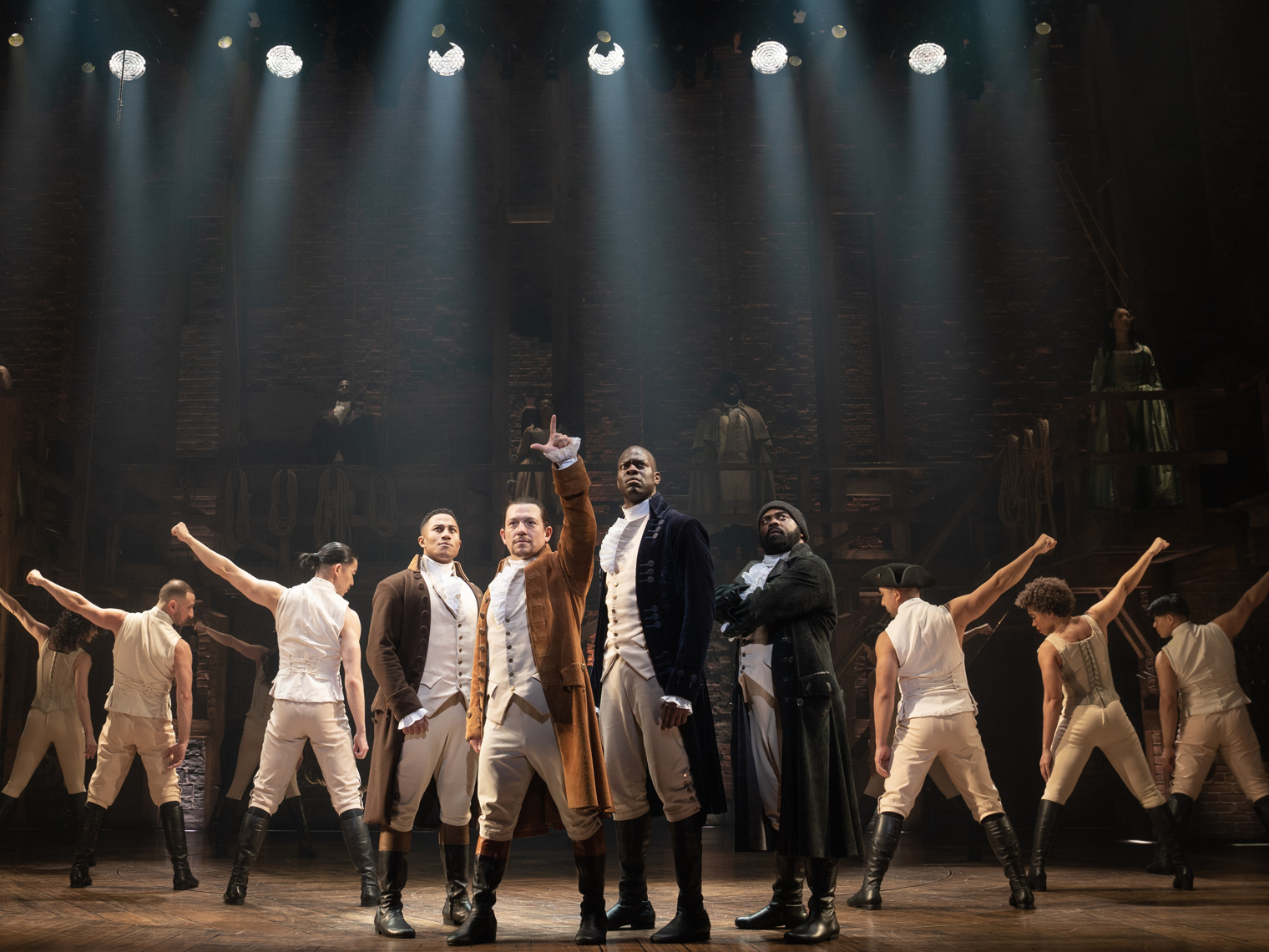 Daniel Yearwood as John Laurens, Miguel Cervantes as Alexander Hamilton, Kyle Scatliffe as Marquis de Lafayette and Ebrin R. Stanley as Hercules Mulligan in <i>Hamilton</i>.